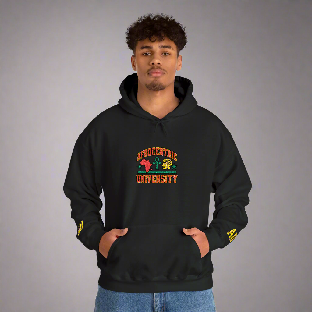 Person wearing a black hoodie with 'Africancentric University' design on a white background
